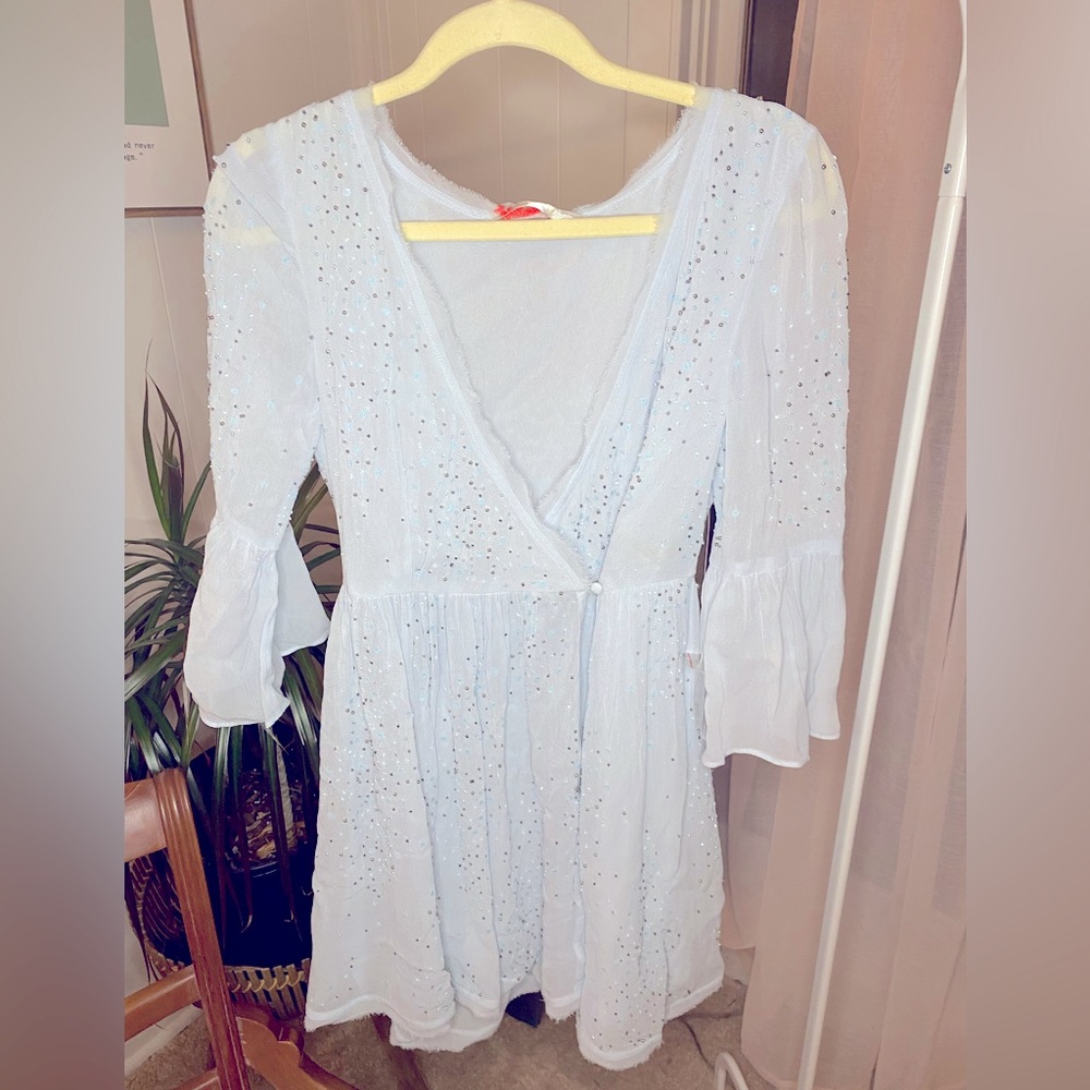 Light blue beaded mini wrap dress